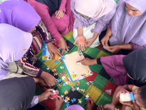 Memperkuat daya rawat komunitas, kepemimpinan perempuan, dan solidaritas dalam menghadapi krisis.